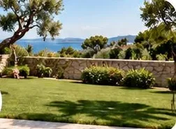 Well-kept garden lawn with sea view