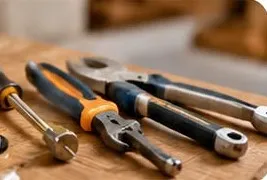 Hand tools on a wooden workbench